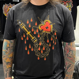 close/Front view of “Love Kills” T-Shirt by Mindzai Apparel showing fit and materials.