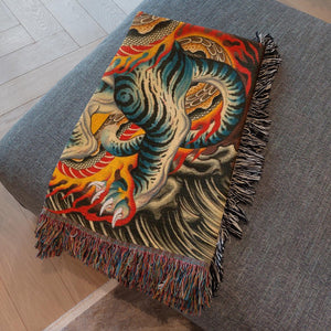 60x80" Great Blanket displayed on a bed emphasizing its vibrant artwork.