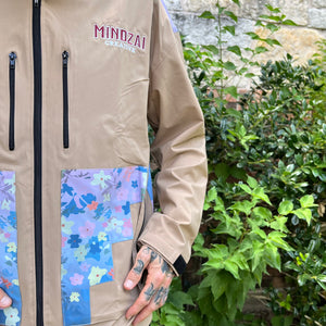 Detail shot of waterproof nylon texture and custom zippers on Thunder Bird jacket.