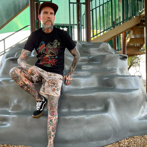 Baroness T-Shirt folded neatly displaying detailed tattoo-inspired design.