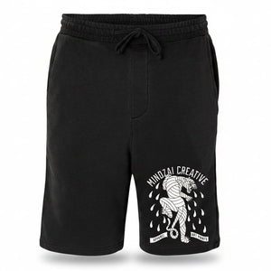 Dark gray shorts with a tiger graphic and text on a white background with artistic designs.