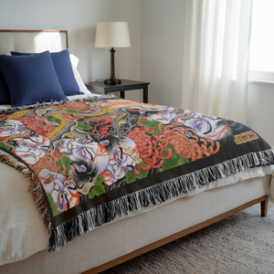 Close-up of the woven design and fringe edge on the Alex Rusty blanket “The Snake & The Namakubi”.