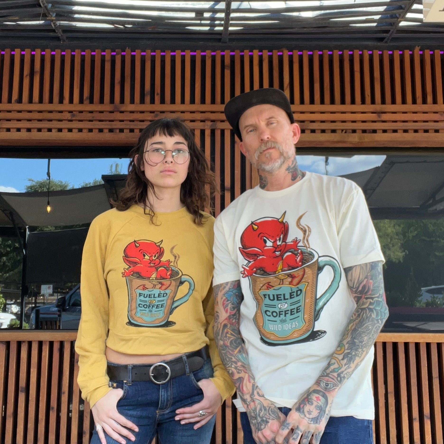 Side/back view of Hot Coffee Tee showing texture and print wrap-around.