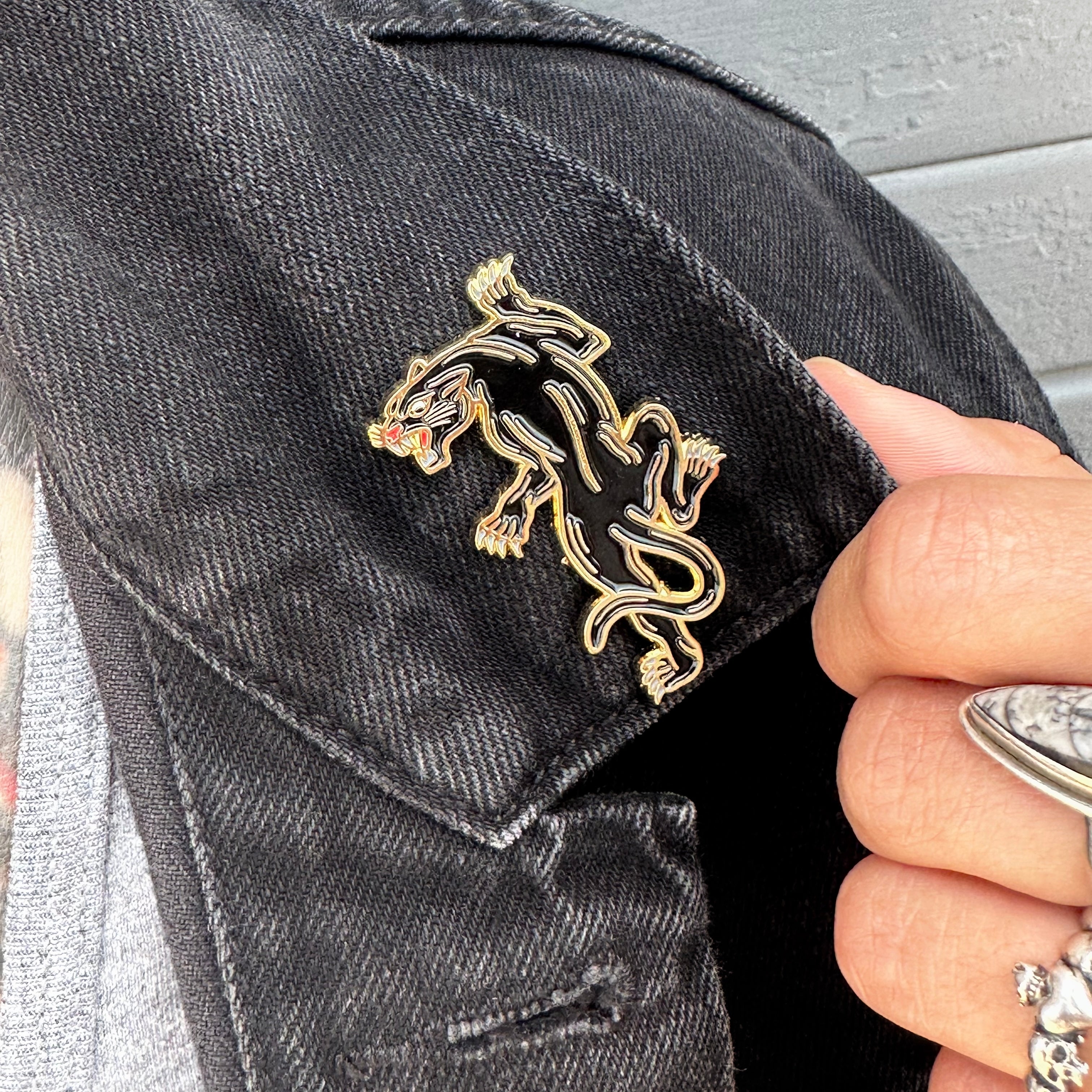 panther lapel pin