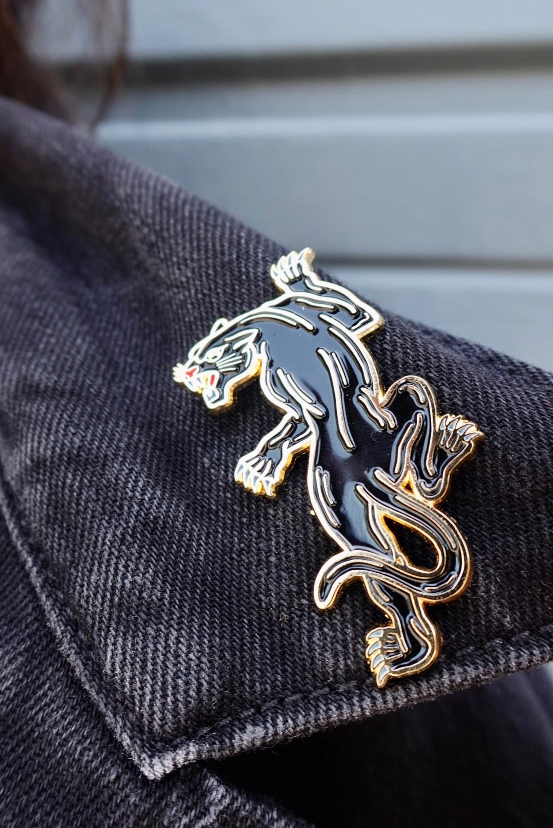tattoo-inspired panther pin
